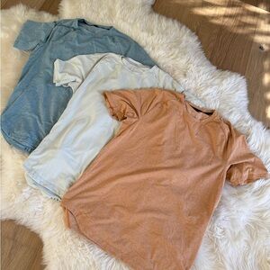 Set of Three license to train mens T-Shirts in Blue, White/green and Orange L